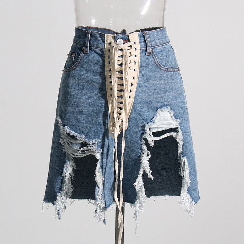 Street cool American ripped jeans 2026 spring new cross strap irregular design ripped jeans