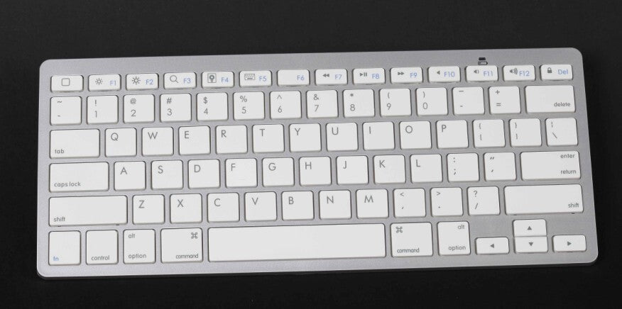 Cross-border hot ultra-thin mini Bluetooth keyboard for mobile phone tablet pc three-system universal wireless keyboard