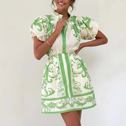 2026 Spring New Europe and America cross border women's casual fashion temperament commute printed cardigan short skirt two-piece set