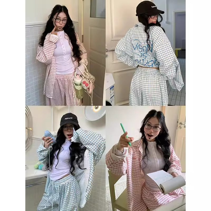 Spring and Autumn new love plaid shirt Women's loose sun protection cardigan design sense niche casual all-matching bandage dress shirt