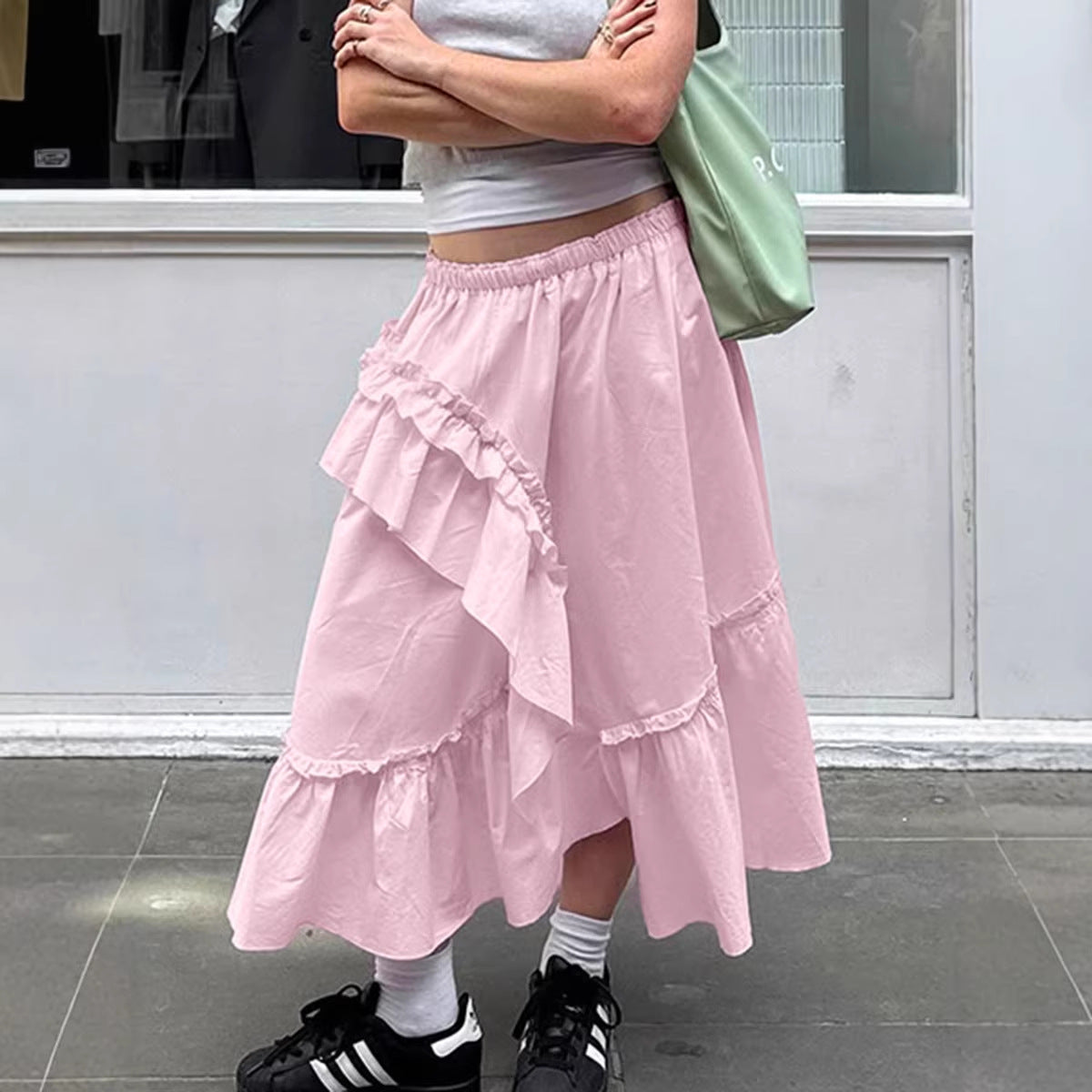 French fashion ruffled skirt female 2026 spring design sense stitching loose high waist A- line skirt cake dress