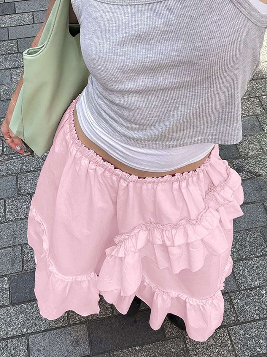 French fashion ruffled skirt female 2026 spring design sense stitching loose high waist A- line skirt cake dress