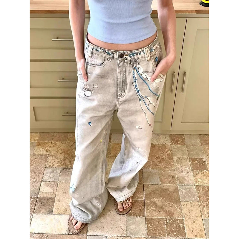 Shop High Street Retro Splash-Ink Worn Jeans at USAve Merchandise. Dirty dyed wide-leg pants for women. Free shipping over $50!