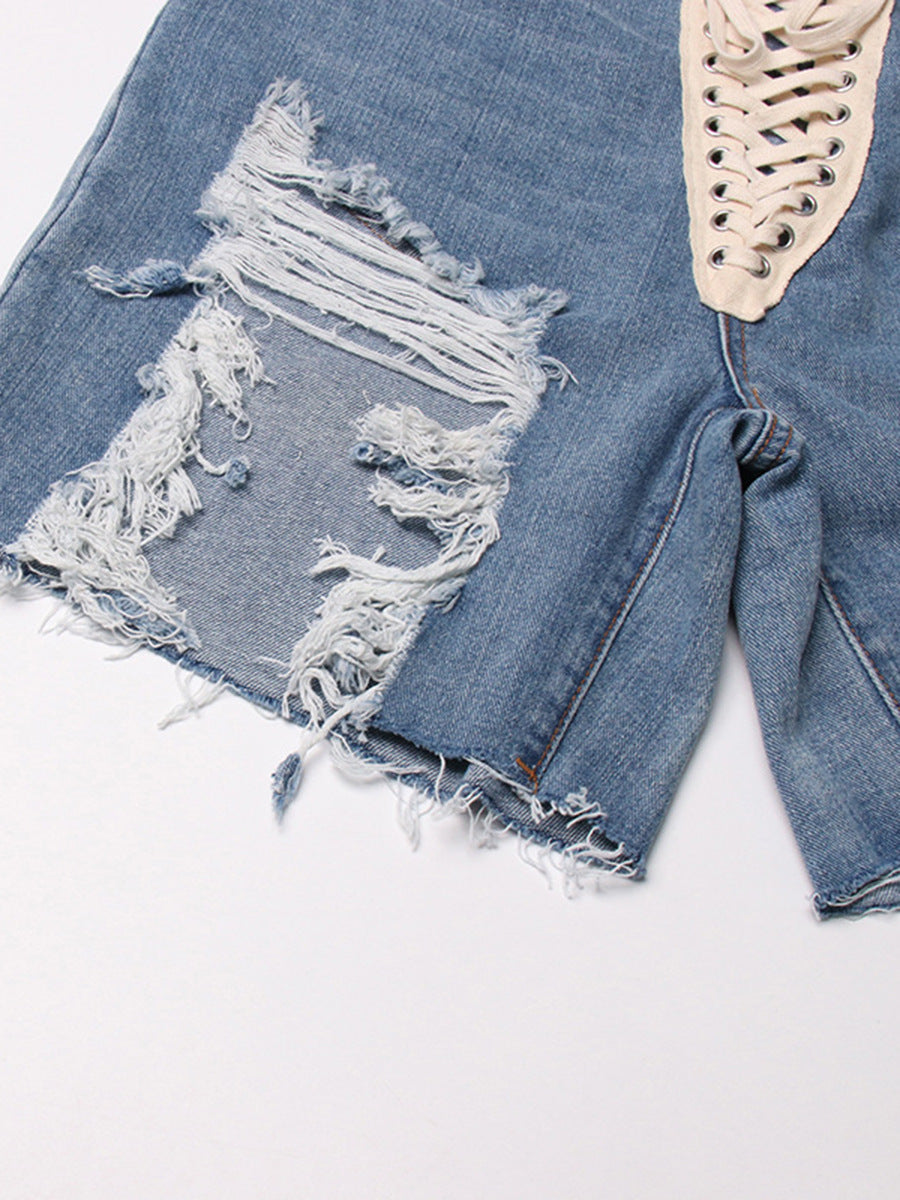 Street cool American ripped jeans 2026 spring new cross strap irregular design ripped jeans