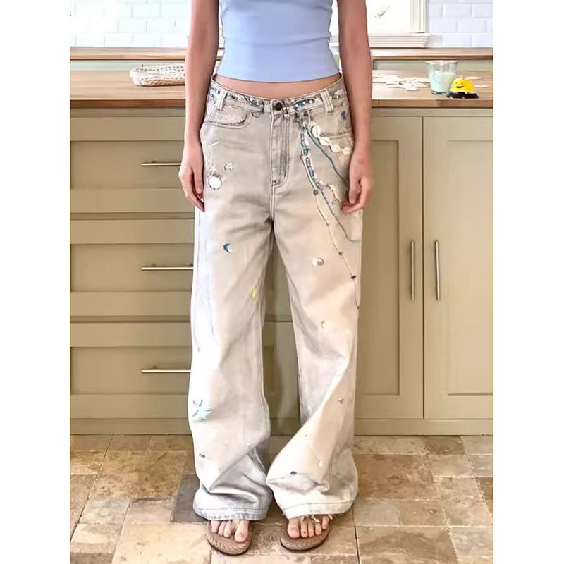 Shop High Street Retro Splash-Ink Worn Jeans at USAve Merchandise. Dirty dyed wide-leg pants for women. Free shipping over $50!