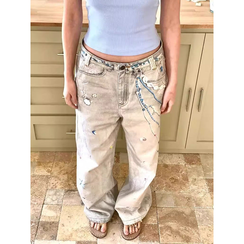 Shop High Street Retro Splash-Ink Worn Jeans at USAve Merchandise. Dirty dyed wide-leg pants for women. Free shipping over $50!